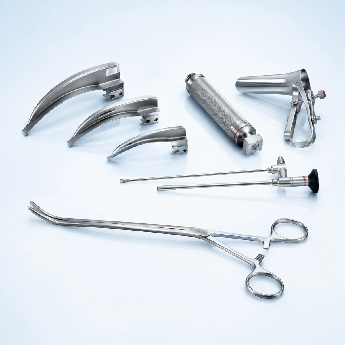 Magill Forceps surgical instrument on a clean clinical blue background
